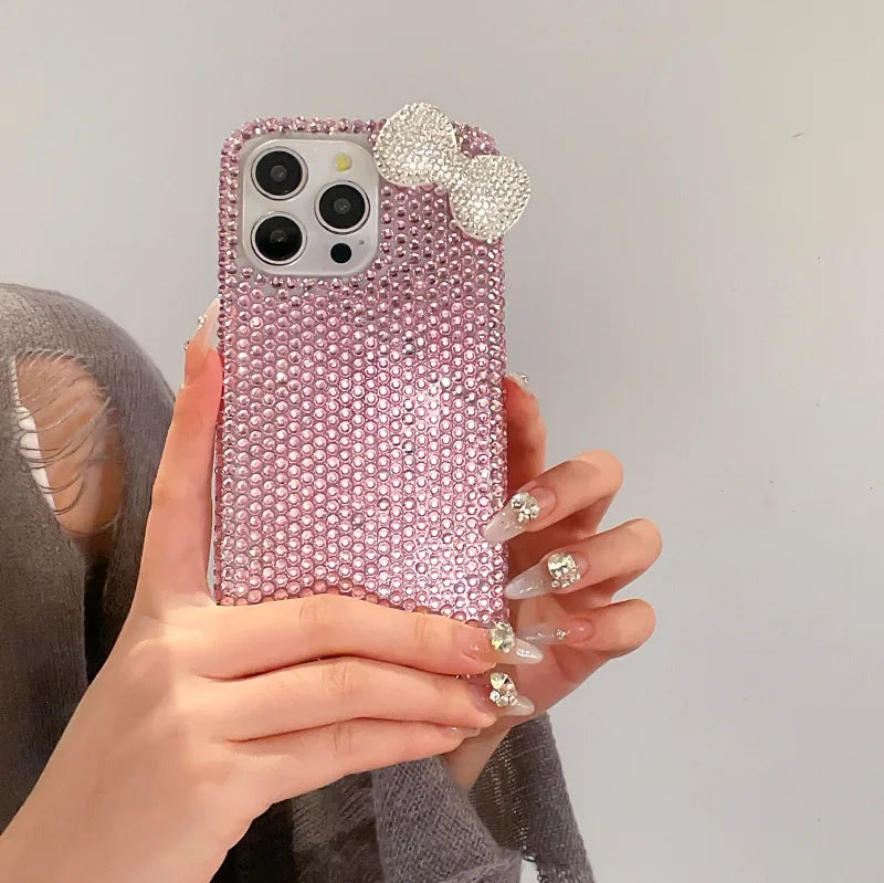 The girl-style rhinestone bow crystal protective case is suitable for all models of Apple phone cases. This is a luxurious diamond material iPhone 17 Pro Max protective case. The sizes available are 16, 15, 14, 13, and 12.