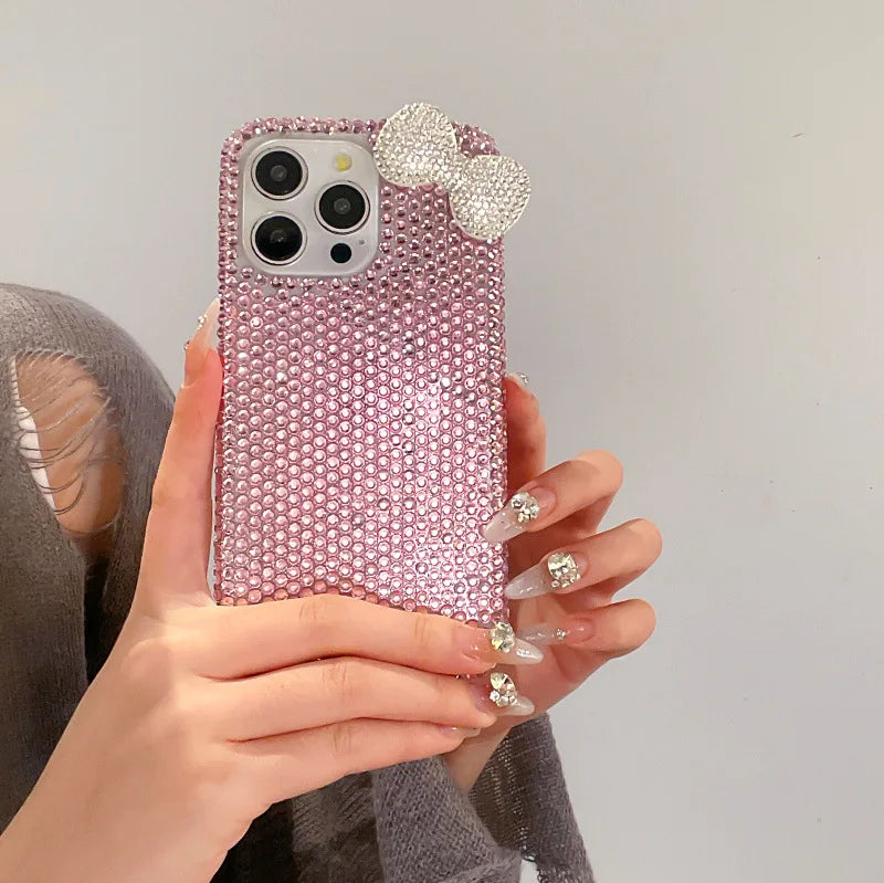 The girl-style rhinestone bow crystal protective case is suitable for all models of Apple phone cases. This is a luxurious diamond material iPhone 17 Pro Max protective case. The sizes available are 16, 15, 14, 13, and 12.