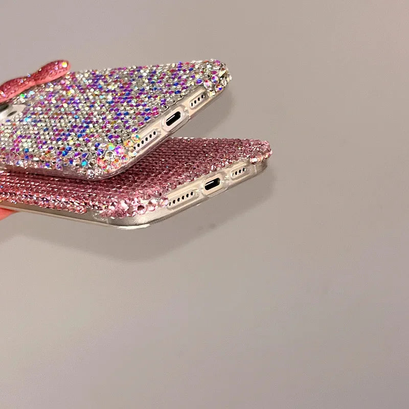 The girl-style rhinestone bow crystal protective case is suitable for all models of Apple phone cases. This is a luxurious diamond material iPhone 17 Pro Max protective case. The sizes available are 16, 15, 14, 13, and 12.